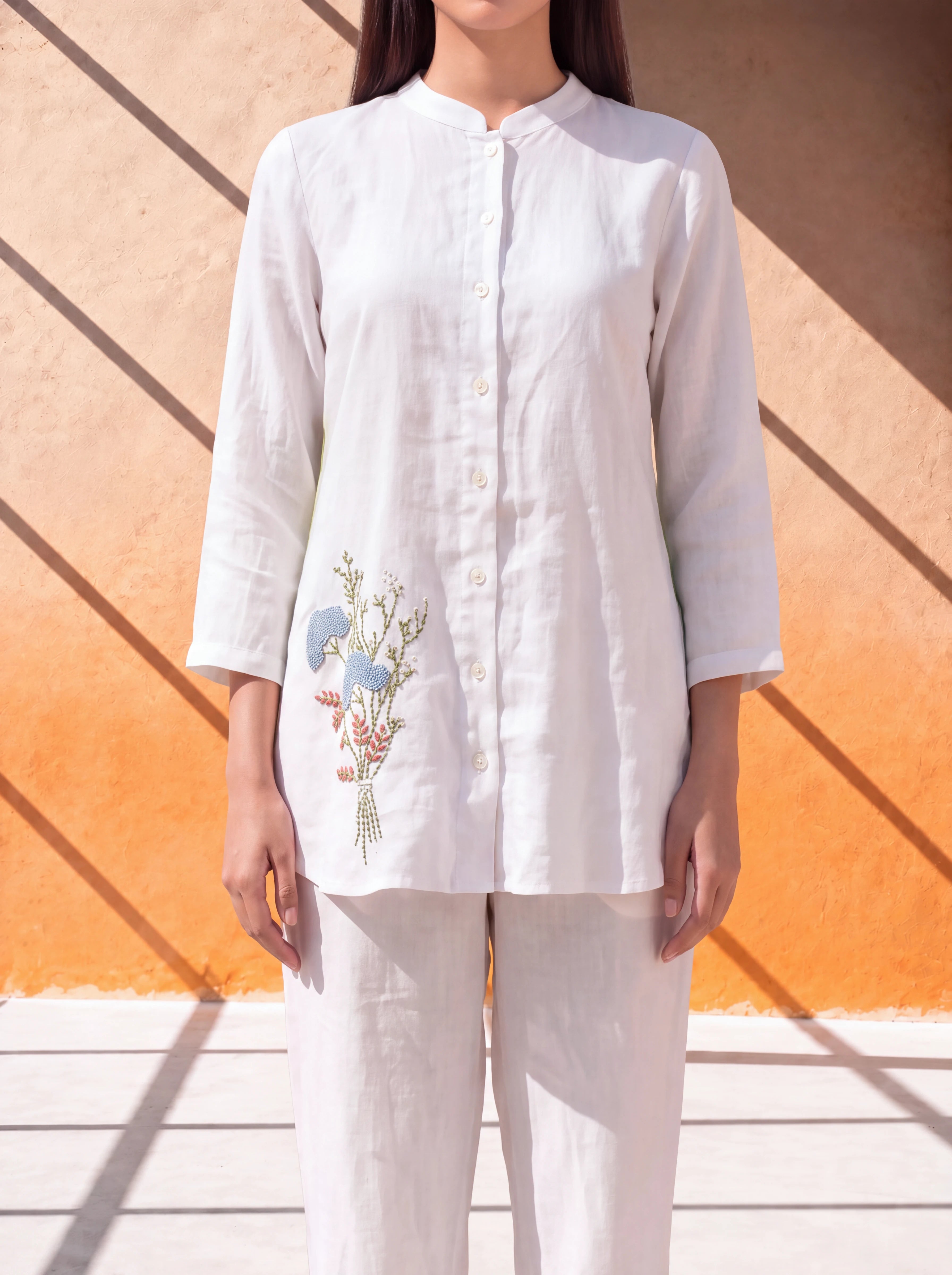 White linen coordinate set with floral embroidery and handworked back design Secondary image
