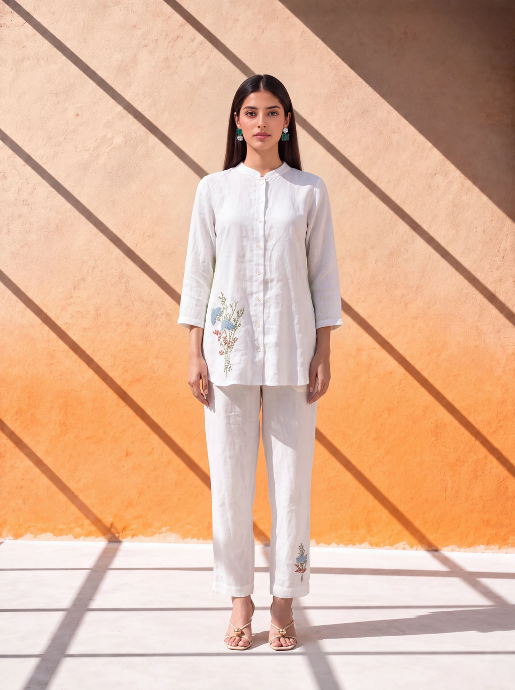 White linen coordinate set with floral embroidery and handworked back design