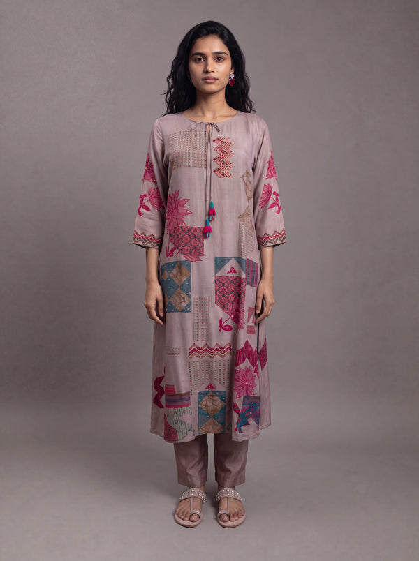 Mauve semi tussar thread and sequins embroidery salwar suit