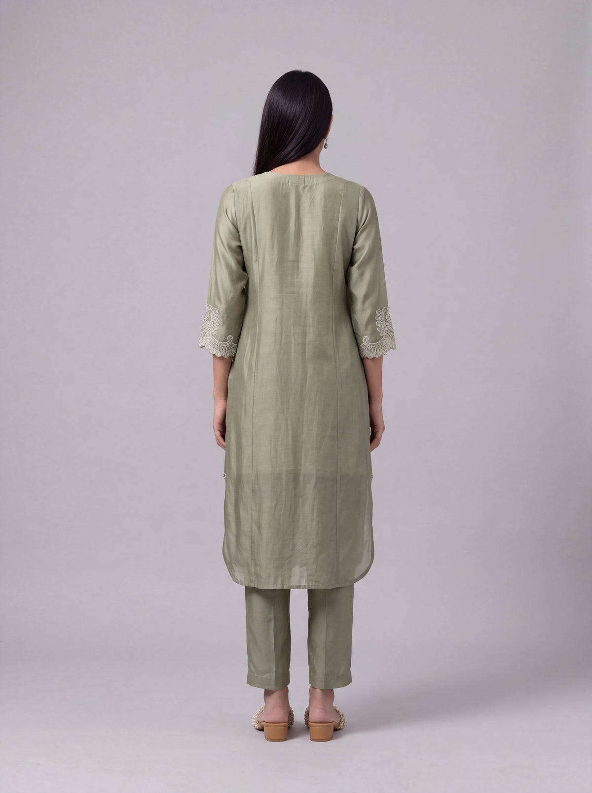 Olive chanderi kurta set with intricate white embroidery