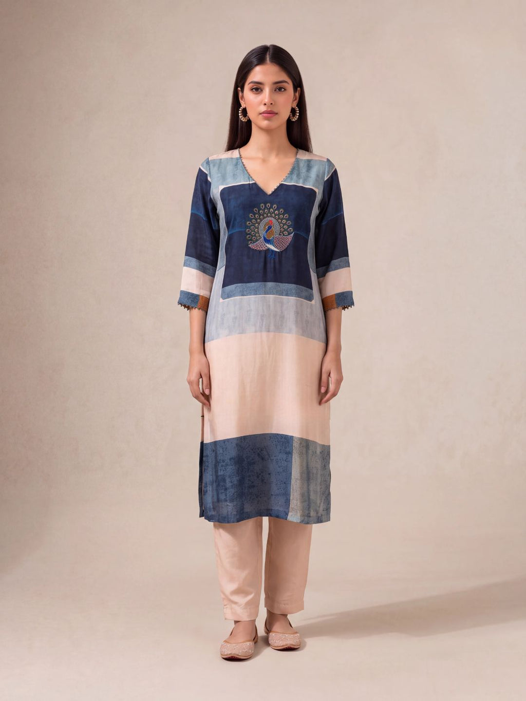 Offwhite semi-tussar salwar suit with peacock khat and kardana embroidery