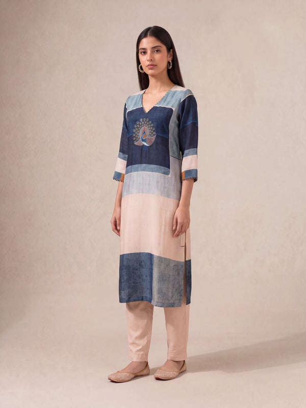 Offwhite semi-tussar salwar suit with peacock khat and kardana embroidery