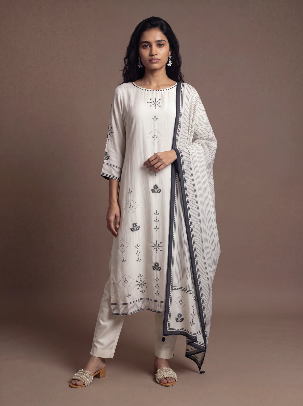 White cotton silk salwar suit with hand sequins Main image
