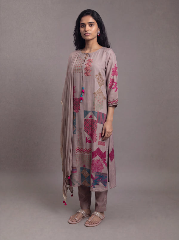 Mauve semi tussar thread and sequins embroidery salwar suit