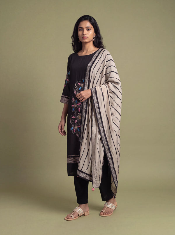 Black floral semi-tussar salwar suit with khat and French knot embroidery