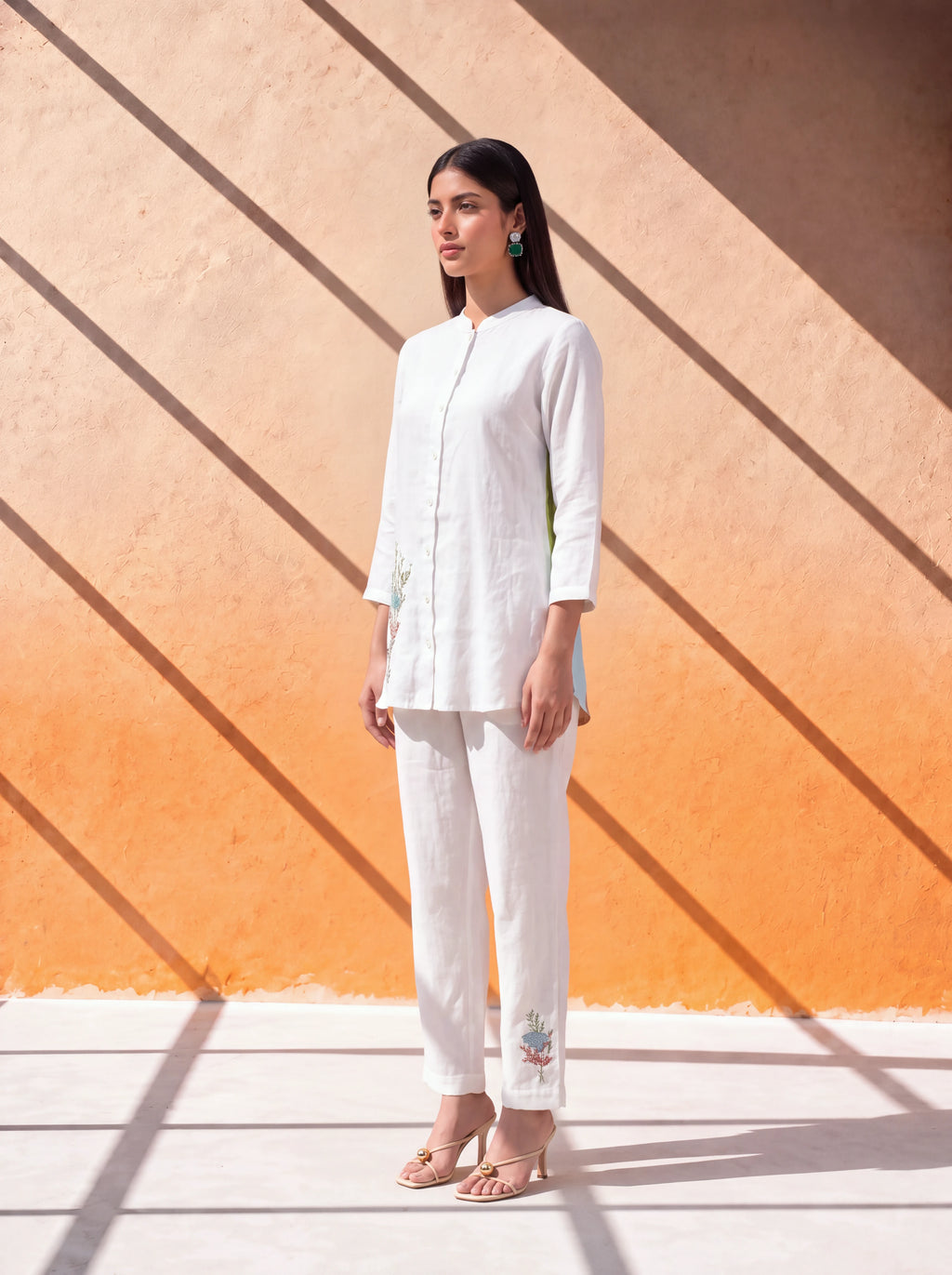 White linen coordinate set with floral embroidery and handworked back design